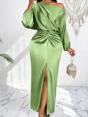 An elegant women's long-sleeve satin dress featuring a twist detail, an asymmetrical shoulder, and a high slit in a solid color.