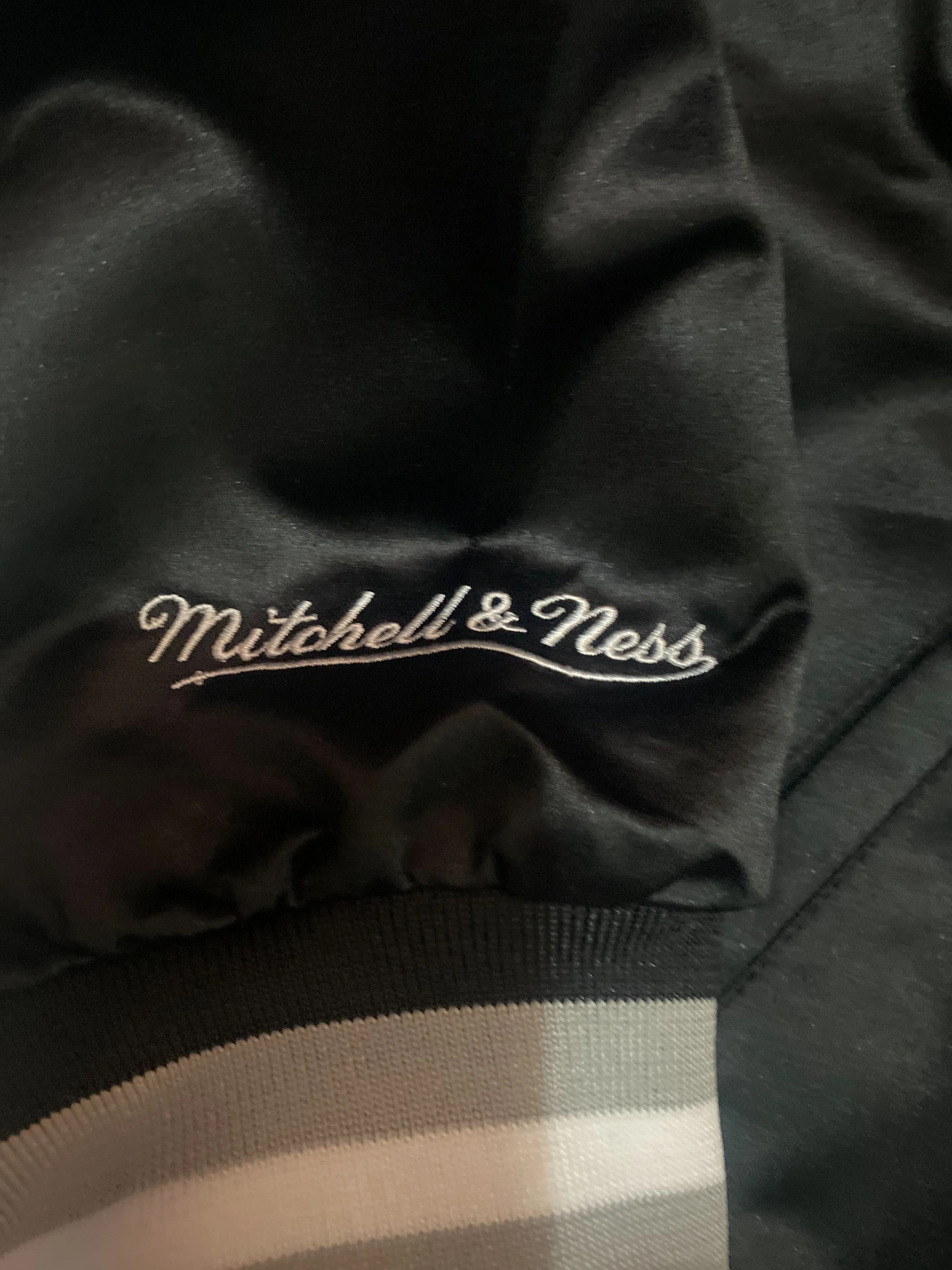 Las Vegas Raiders NFL Mitchell & Ness Lightweight Satin Men’s Jacket With Team Logo on the Back