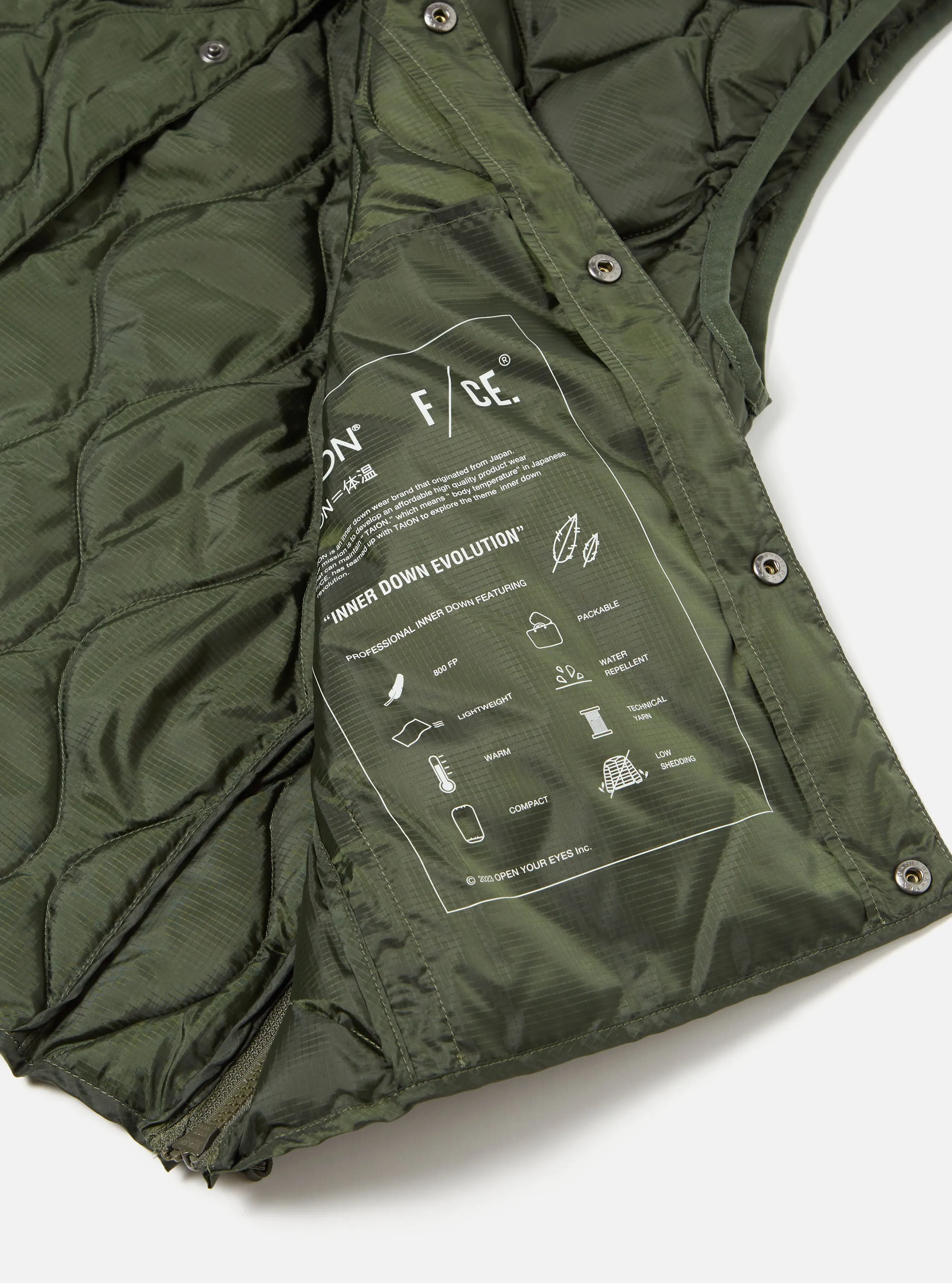 Taion by F/CE. Packable Down Vest in Olive Nylon Ripstop/Duck Down